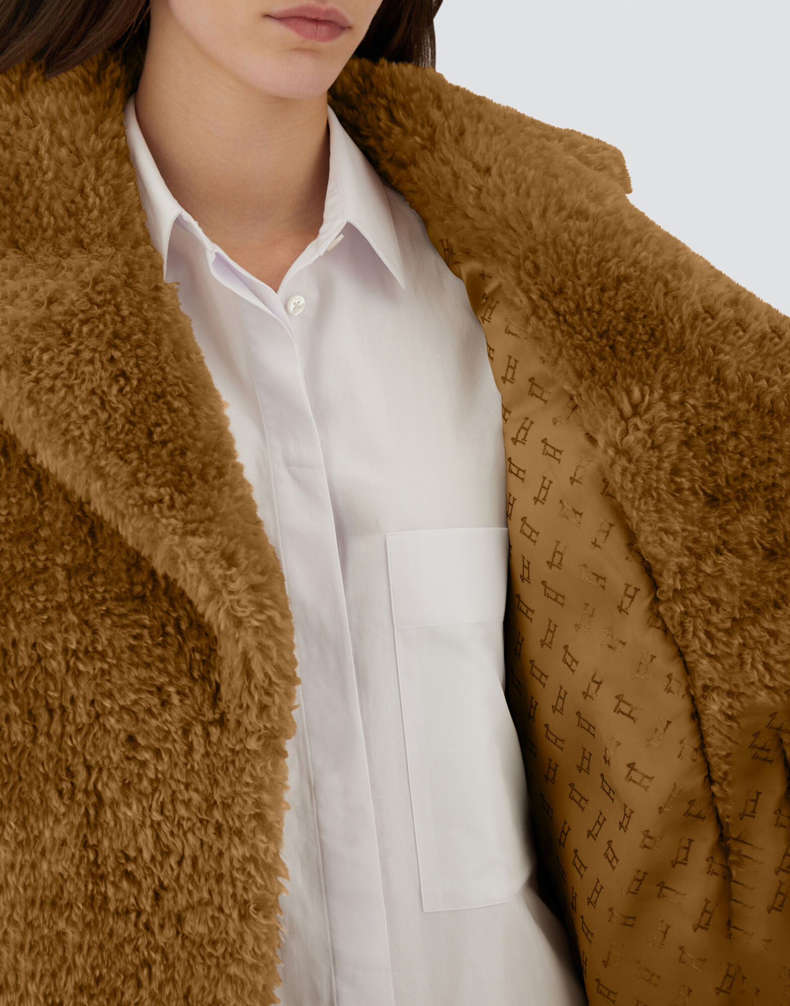 COAT IN CURLY ALTERNATIVE FUR