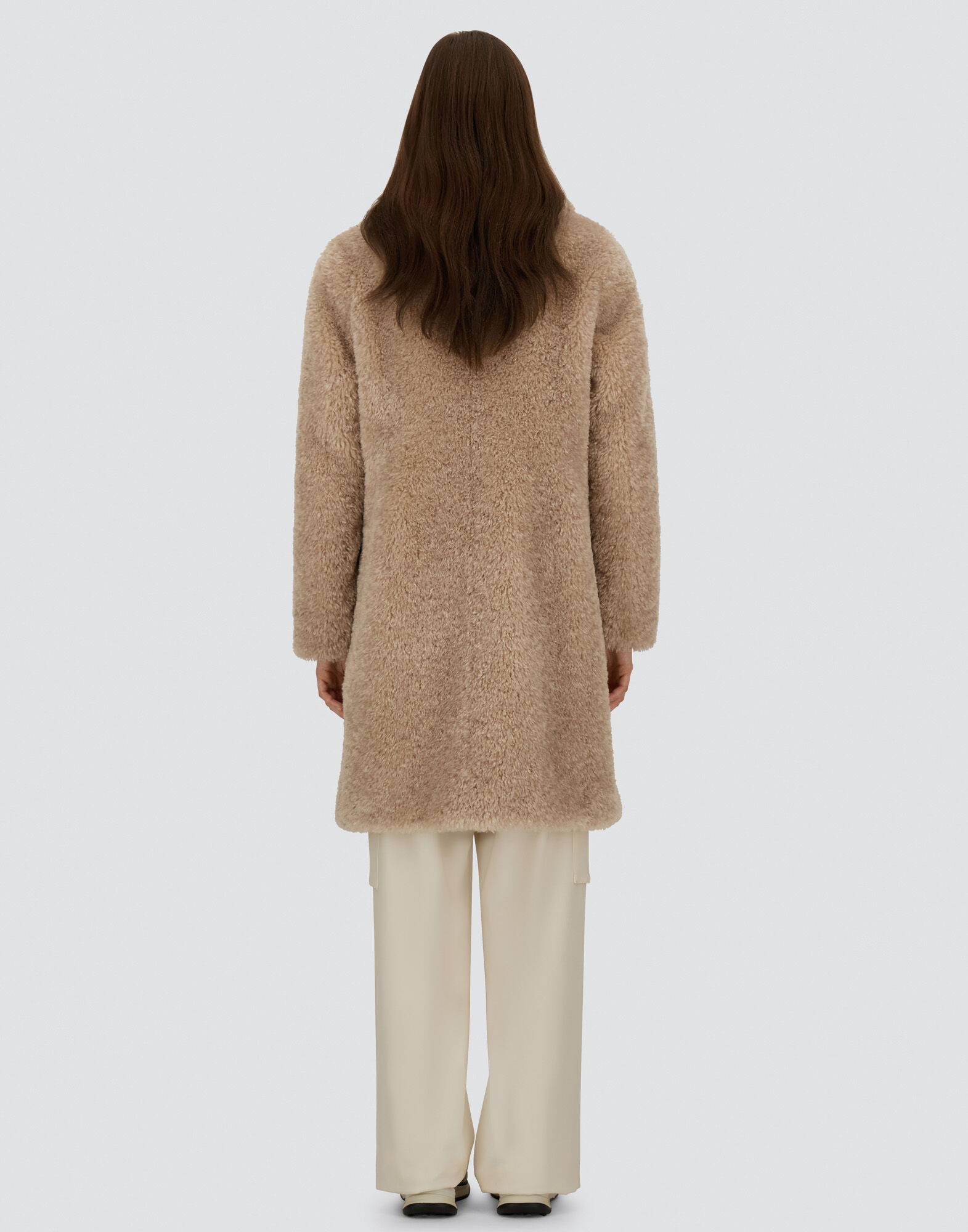 COAT IN CURLY ALTERNATIVE FUR
