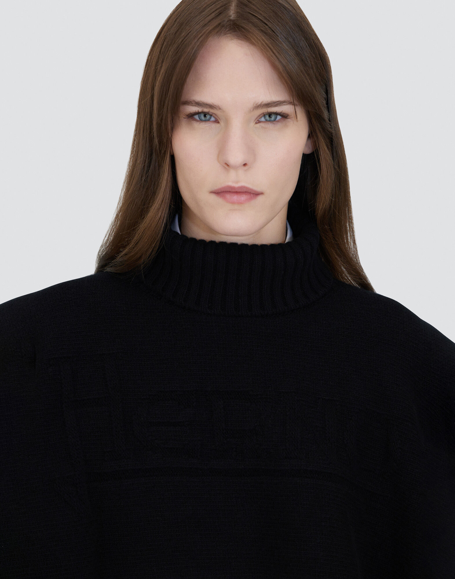 PONCHO IN 100% WOOL