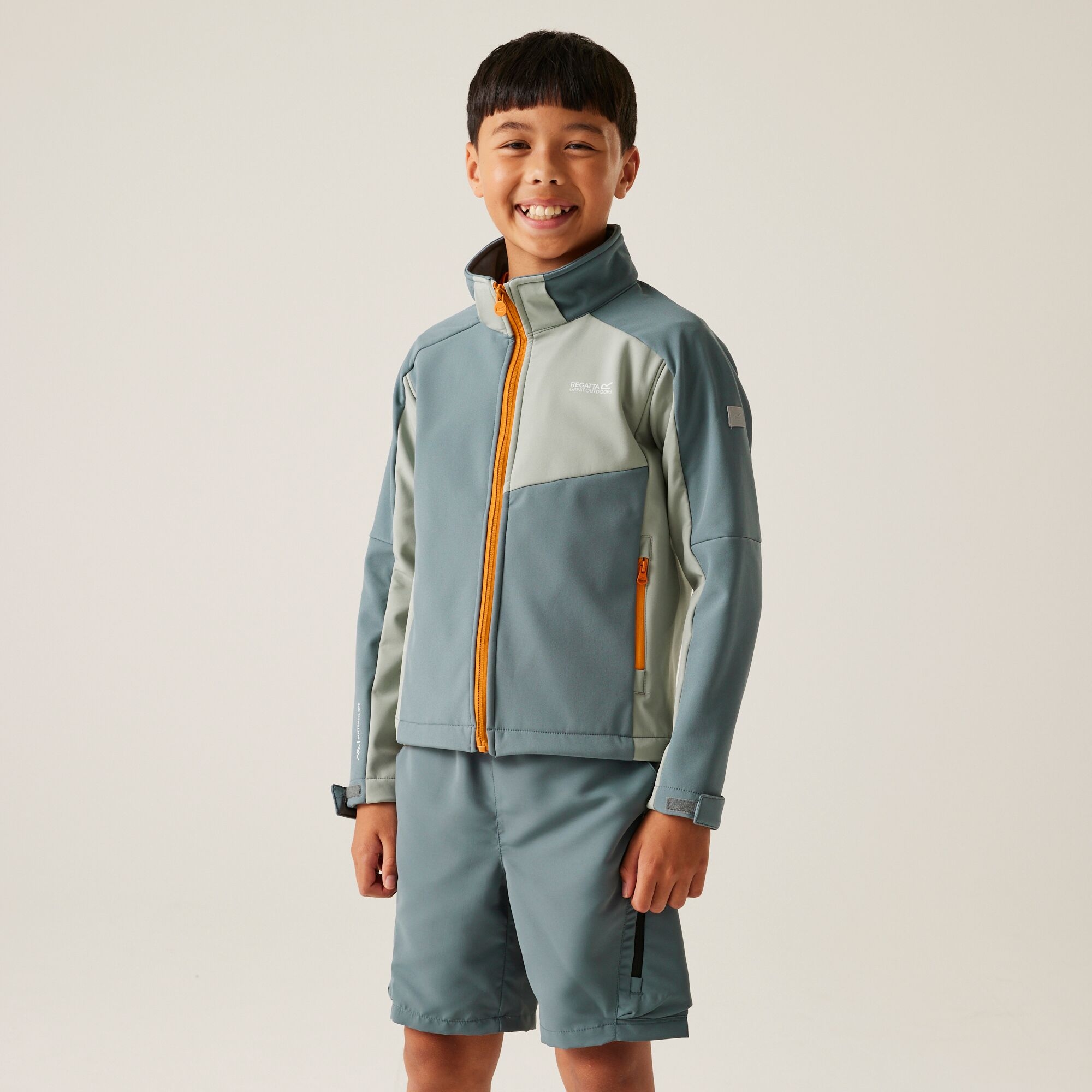 Kids' Acidity VIII Softshell Jacket | Stormy Weather Glacier Bright Marigold