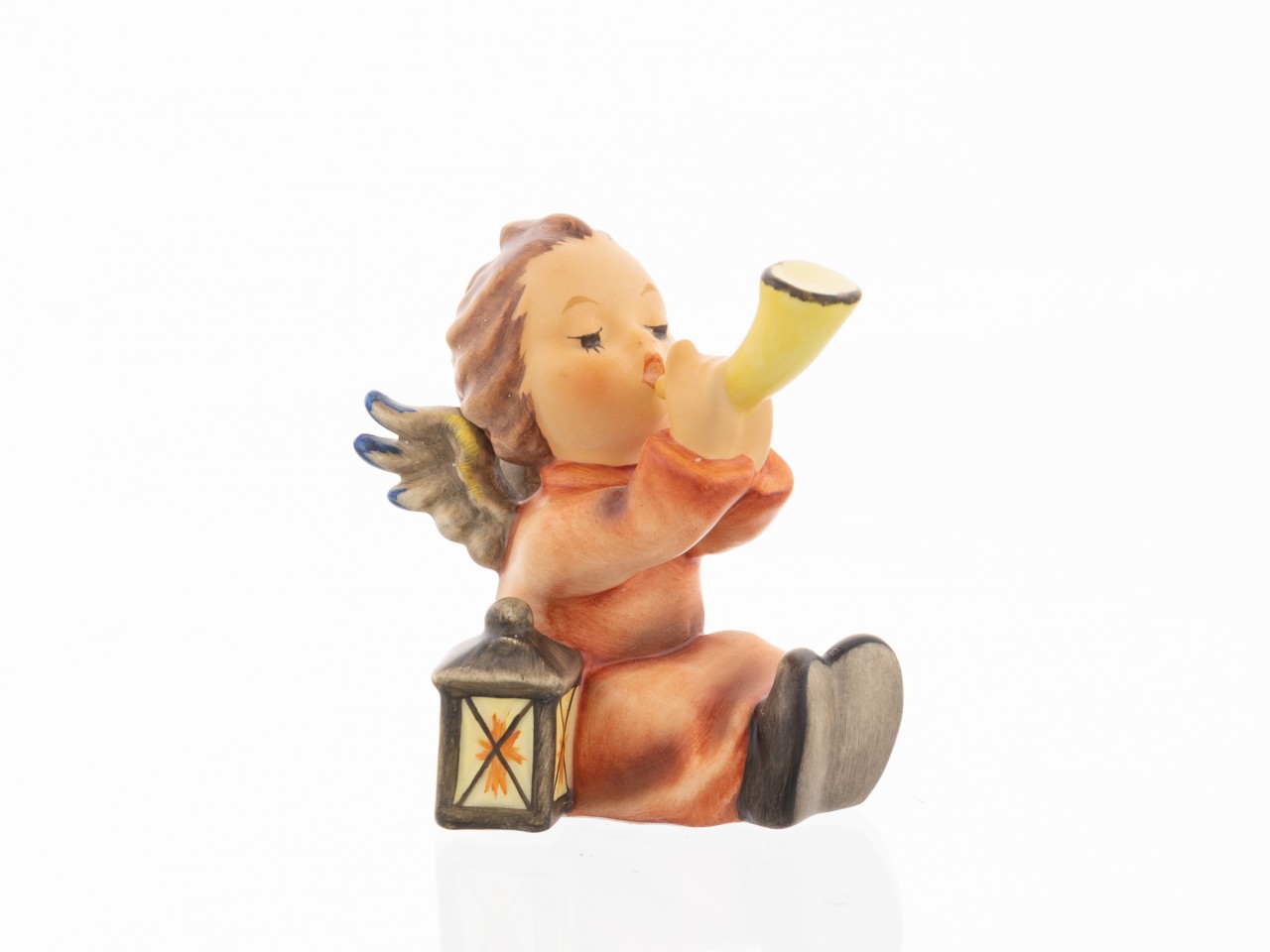 Hum 359 - Sitzender Engel mit Horn