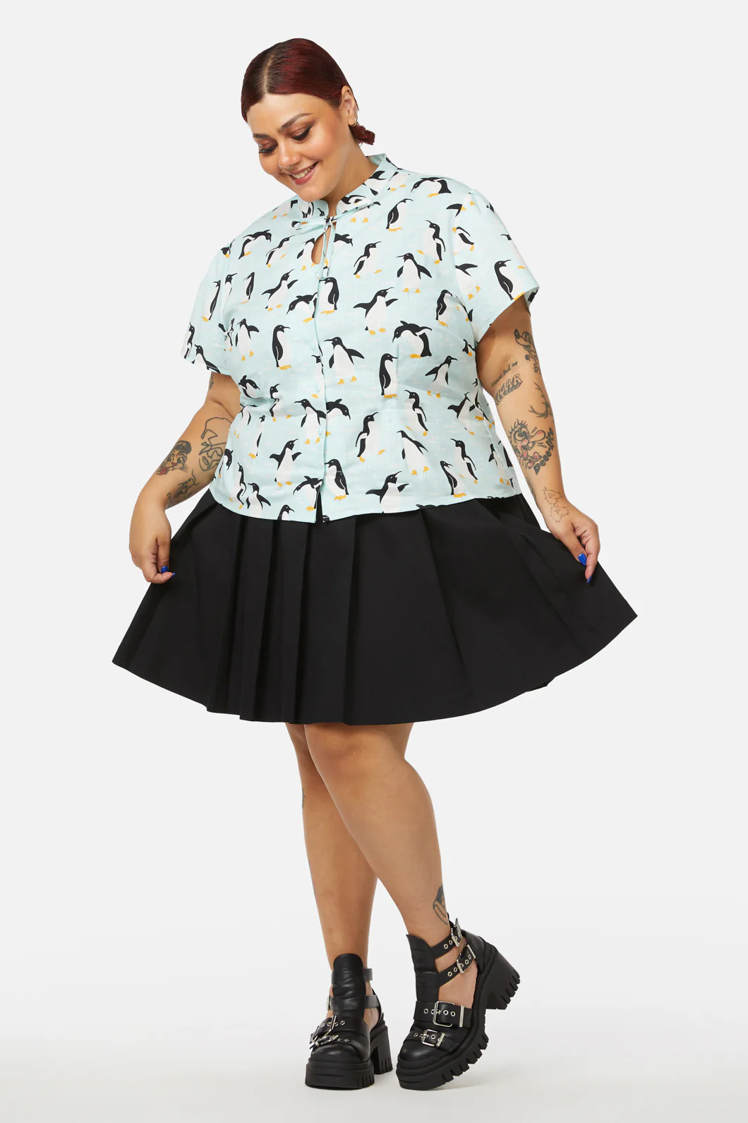 Curve Penguin Blouse