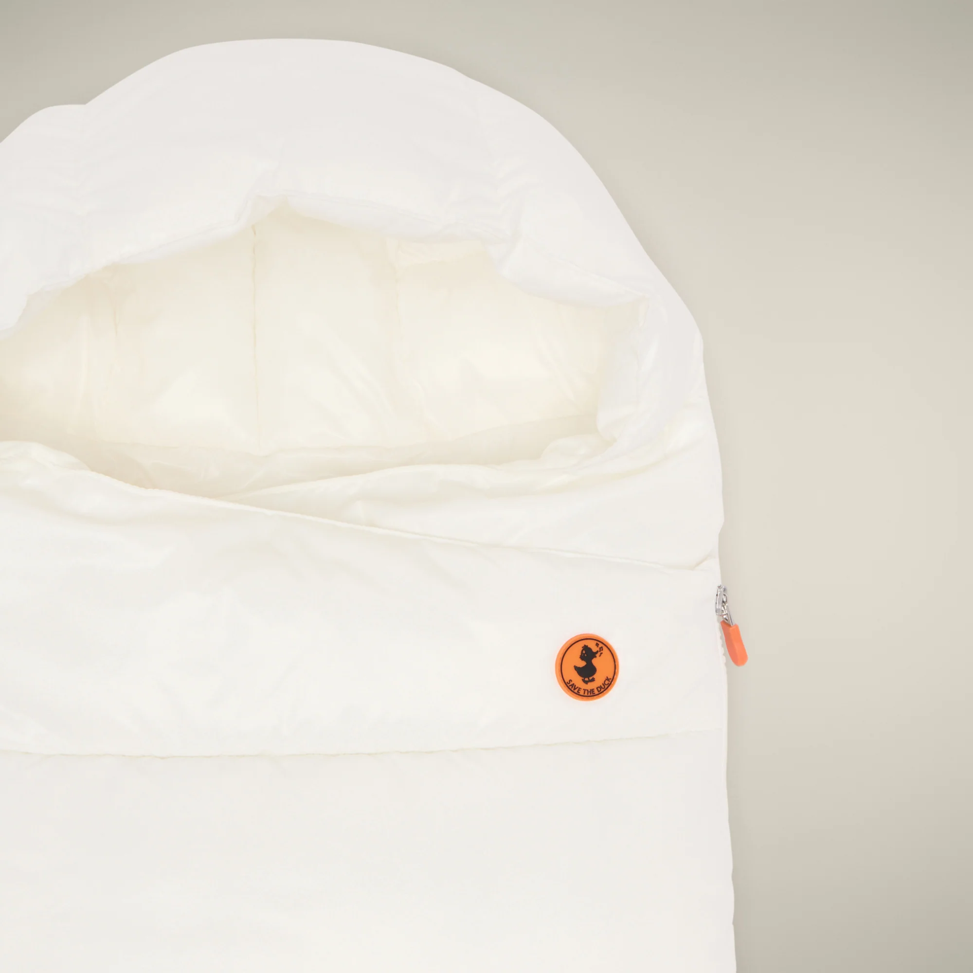 Unisex baby sleeping bag Kay in off white