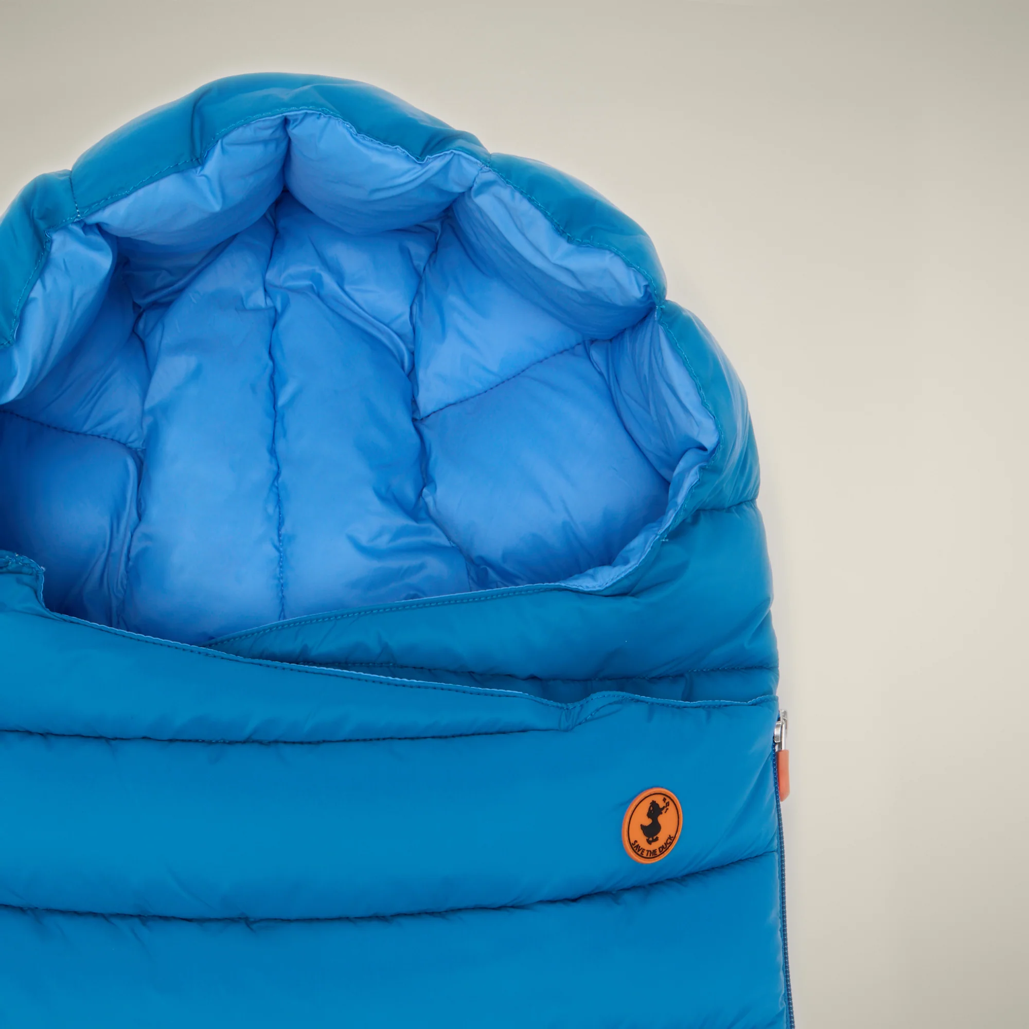 Unisex baby sleeping bag May in blue berry