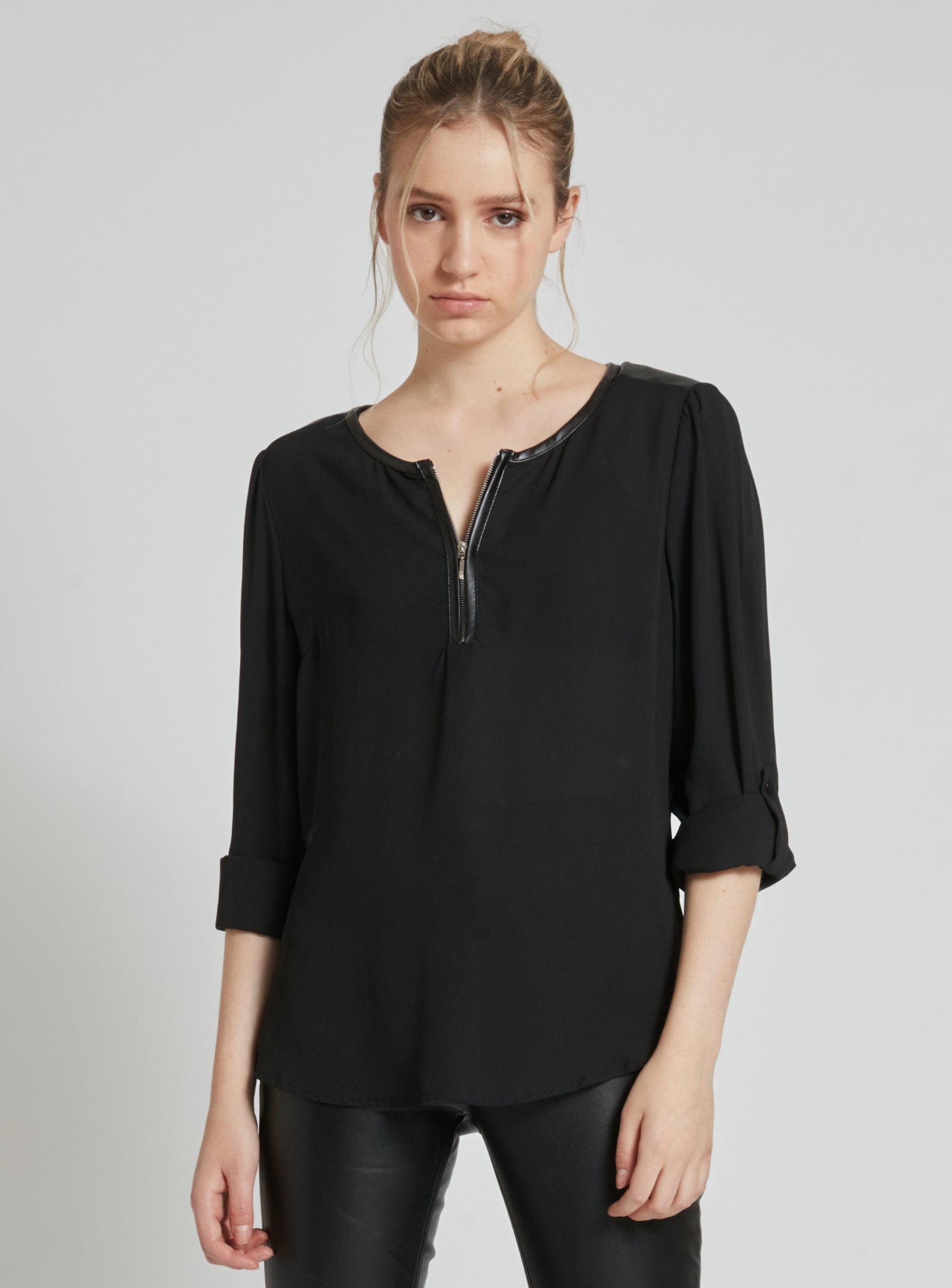 GISELE | Long sleeve blouse with zipper at neckline opening and P.U. accents. || GISELE | Chemisier à manches longues avec fermeture éclair à l'ouverture de l'encolure et P.U. accents.