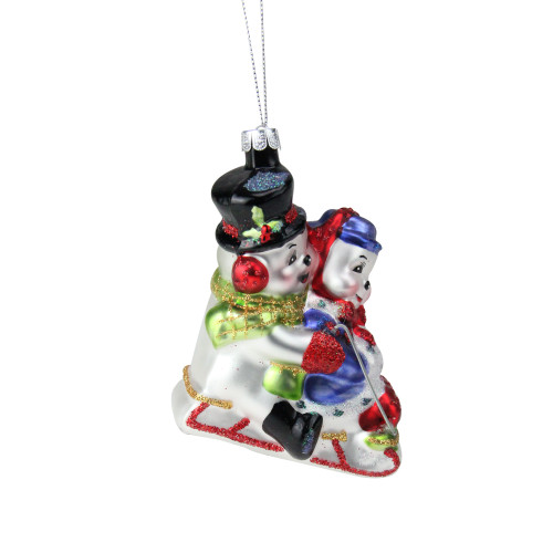 4.5" White and Red Cheerful Sledding Snowmen Couple Glass Christmas Ornament