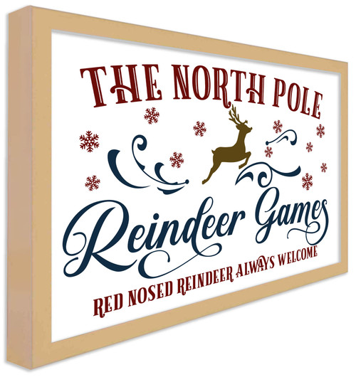 The North Pole Reindeer Games 14.5" x 21.5" Framed Christmas Wall Decor Art Print Sign Poster in a Natural Wooden Frame with UV Acrylic and Hangers