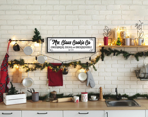 Mrs Claus Cookie Company 9.5" x 25.5" Framed Christmas Wall Decor Art Print Sign Poster in a Black Wooden Frame with UV Acrylic and Hangers