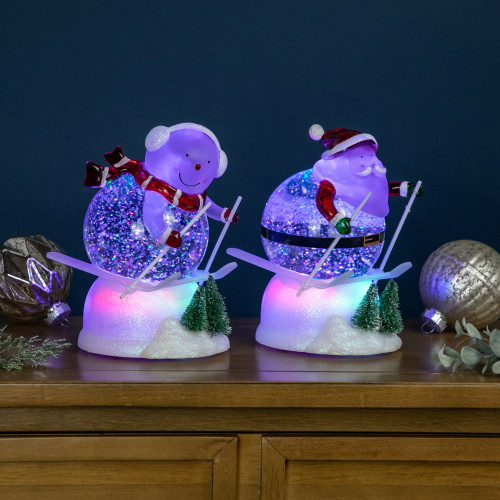 LED Lighted Color Changing Skiing Santa and Snowman Acrylic Christmas Snow Globes - 7.25" - Set of 2