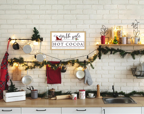 North Pole Chocolate Company Hot Cocoa 10.5" x 19.5" Framed Christmas Wall Decor  Sign Poster in a Natural Wooden Frame with UV Acrylic and Hangers