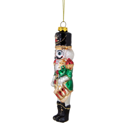 5.25" Green, Red and Gold Nutcracker With Drum Glass Christmas Ornament