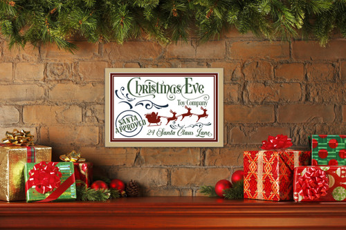Christmas Eve Toy Company 16" x 23.5" Framed Christmas Wall Decor Art Print Sign Poster in a Natural Wooden Frame with UV Acrylic and Hangers