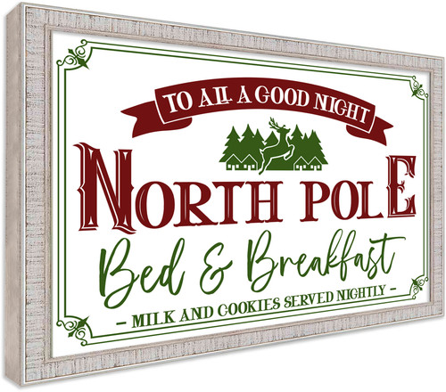 North Pole Bed and Breakfast 15" x 21.5" Framed Christmas Wall Decor Art Print Sign Poster in a White Wooden Frame with UV Acrylic and Hangers