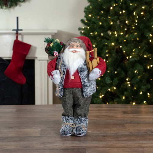 18" Standing Santa Christmas Figure Carrying Presents and a Sled