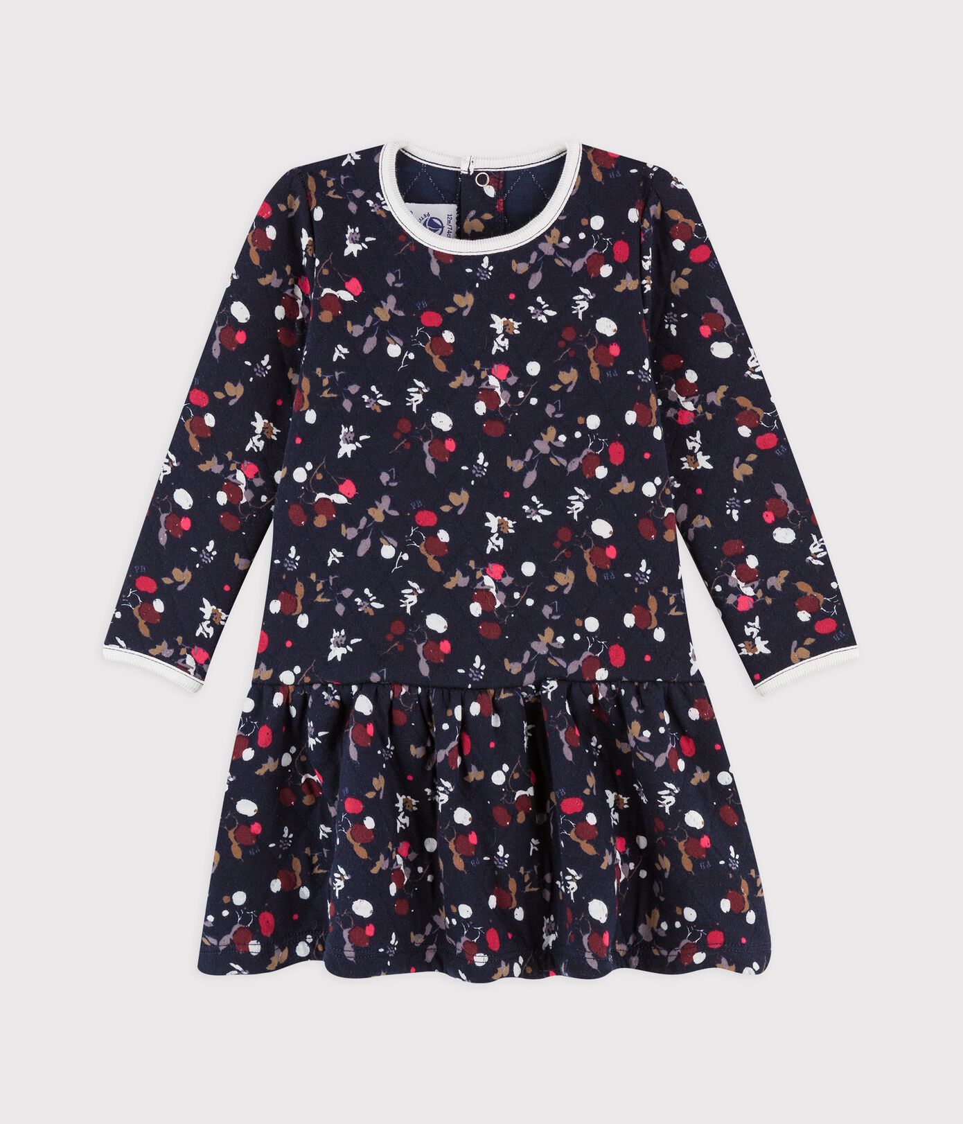 Robe manches longues en coton bébé.