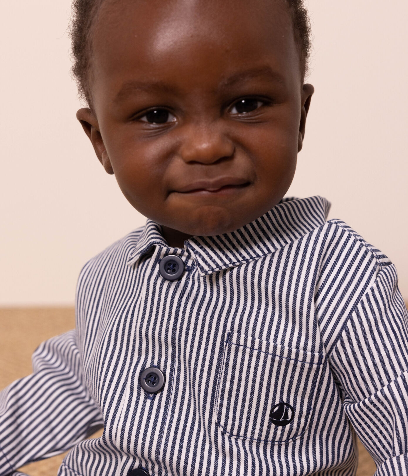 Combinaison longue bébé en toile rayée