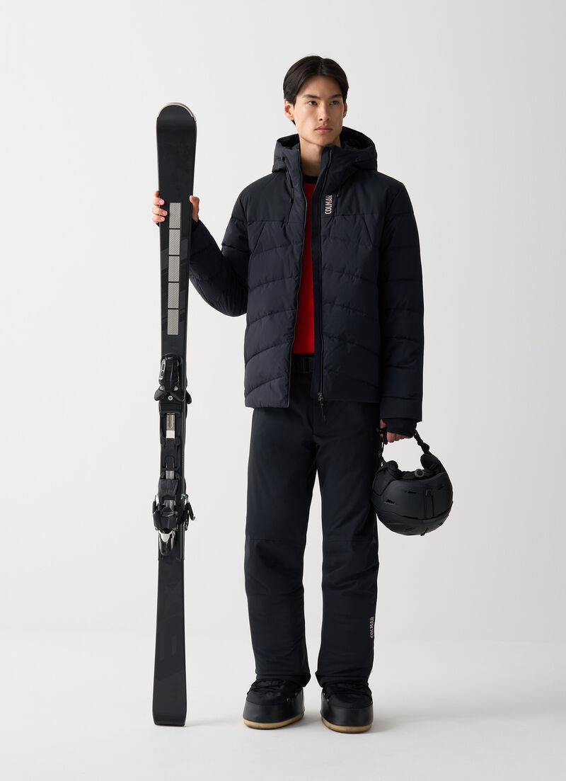 Ski gloves with stretch inserts