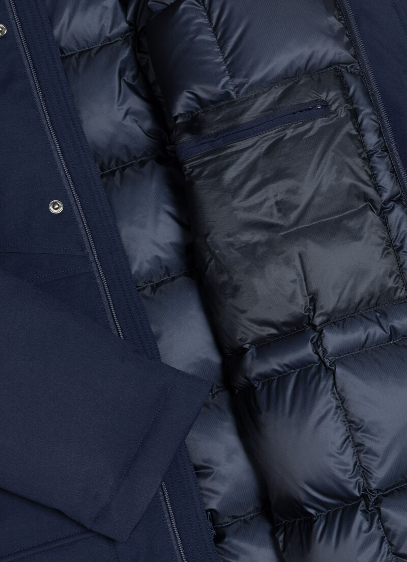 Long twill down jacket with patch pockets.