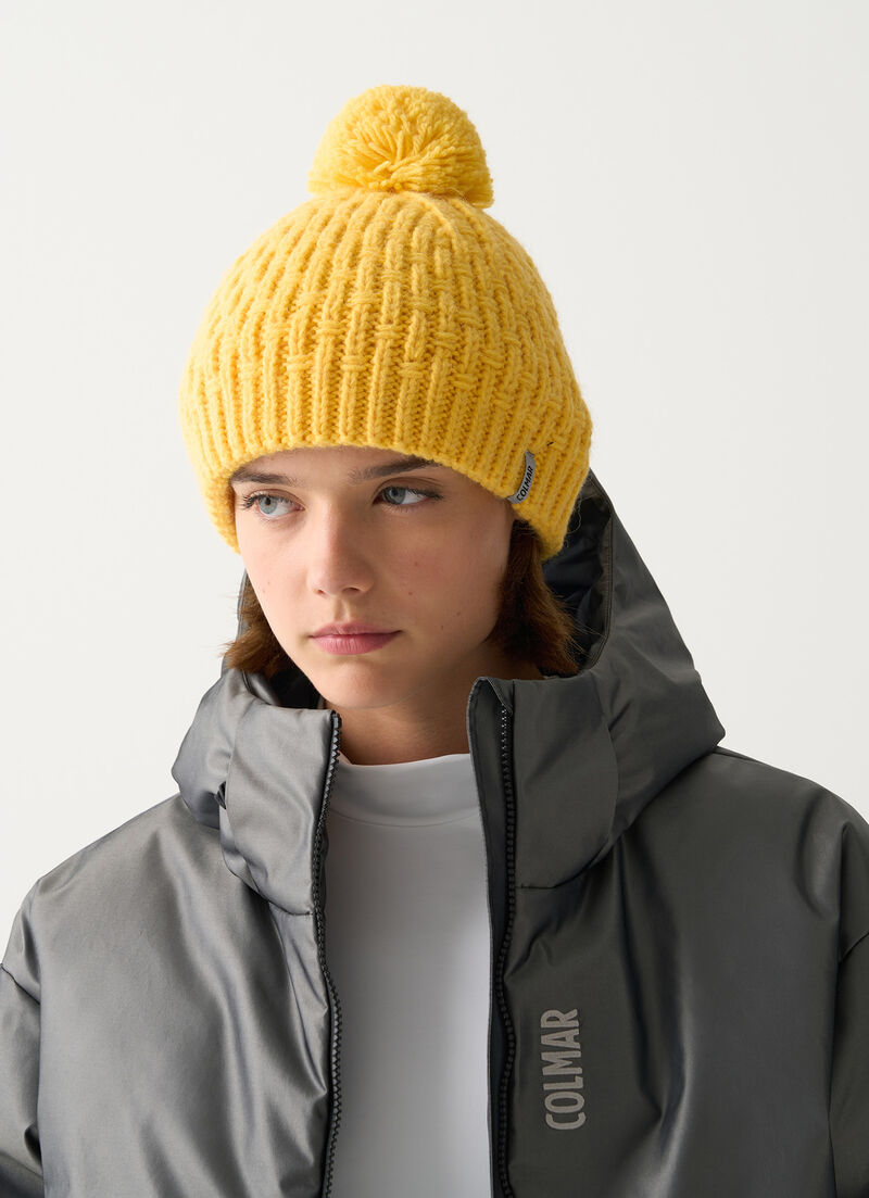 Women’s hat with faux fur pom-pom