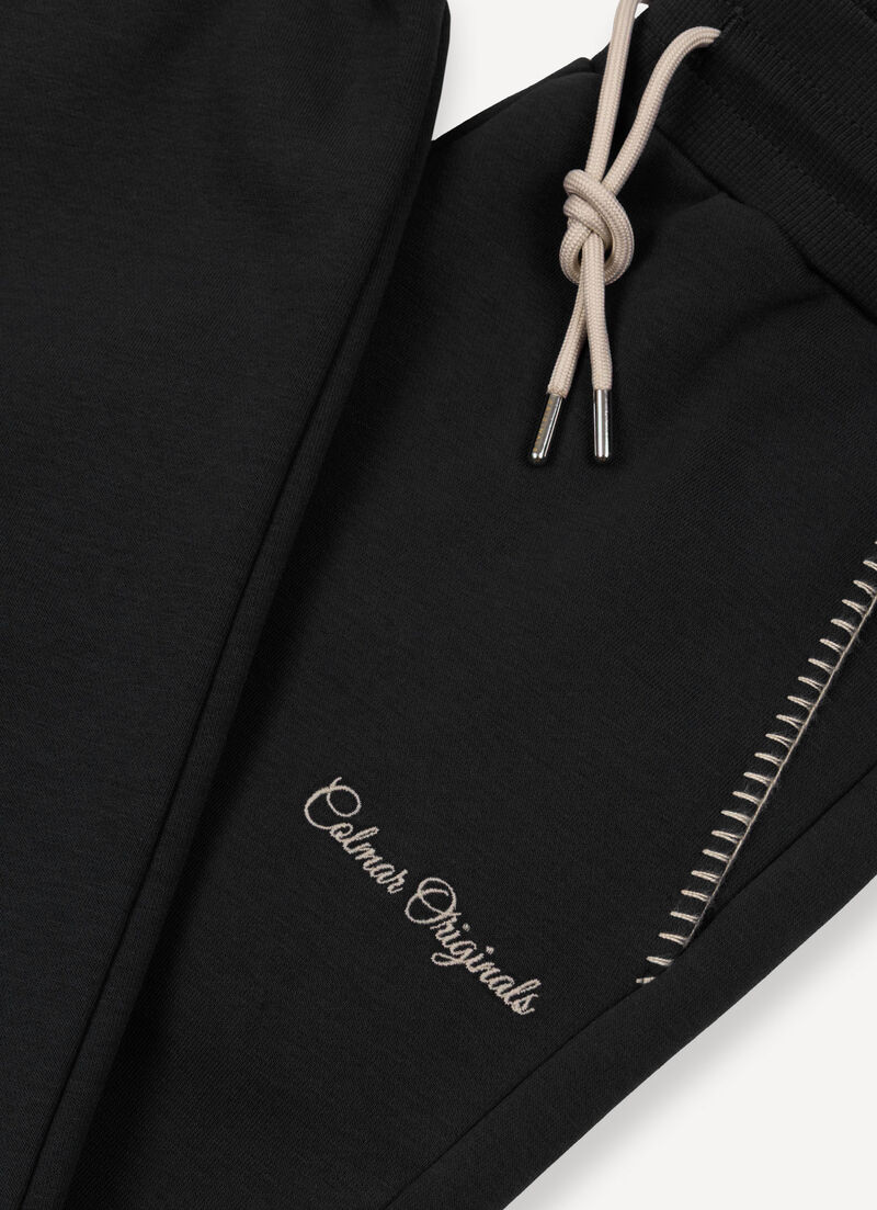 Tracksuit bottoms with embroidery