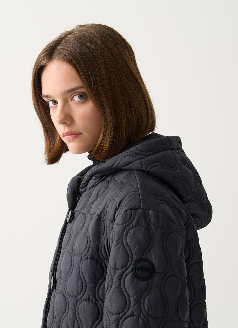 Light teardrop-quilted jacket.