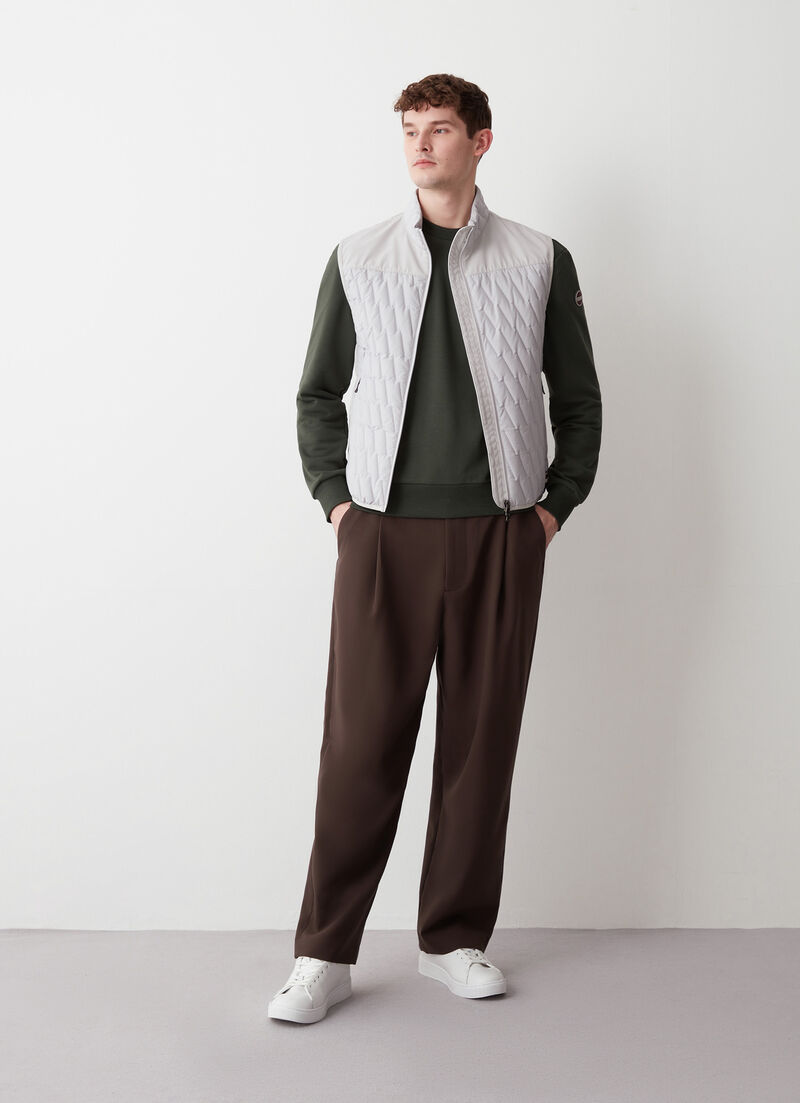 Quilted gilet with softshell inserts