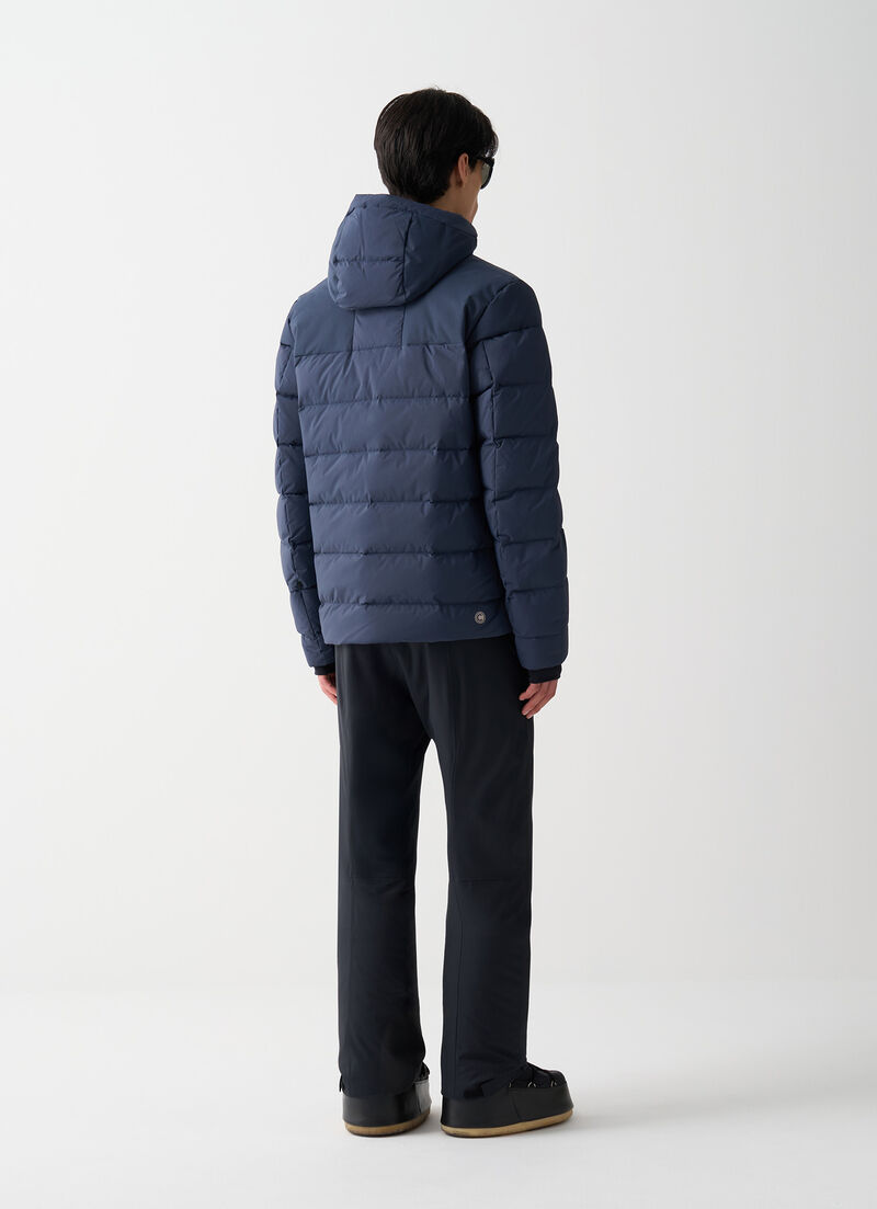 Ski gloves with stretch inserts