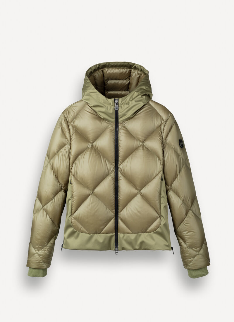 Down jacket with lateral side zip closure.