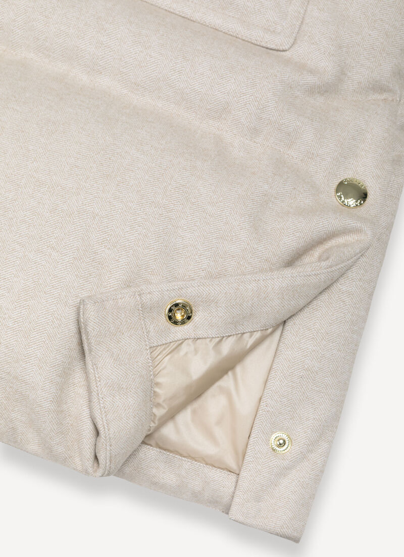 Long down jacket with chevron pattern