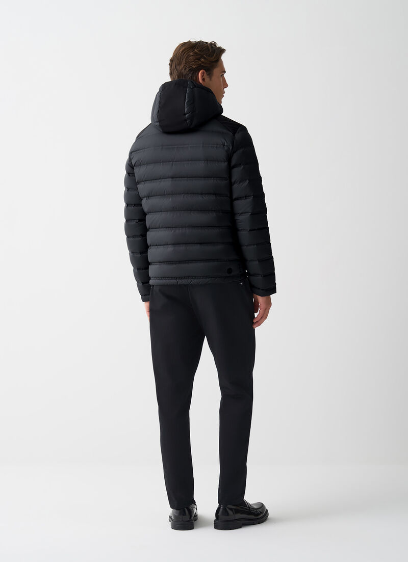 Seamless quilted down jacket with smooth inserts