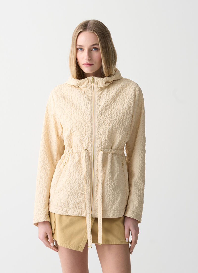 Embossed jacket with drawstring