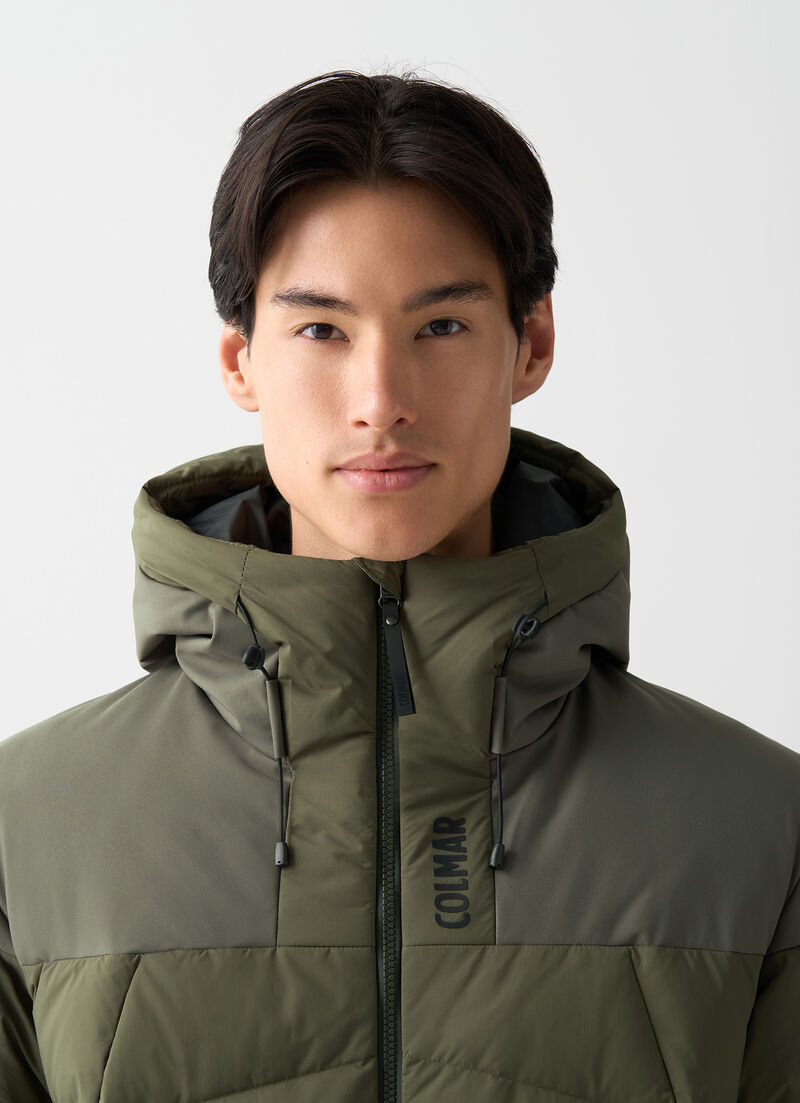 Ski gloves with stretch inserts