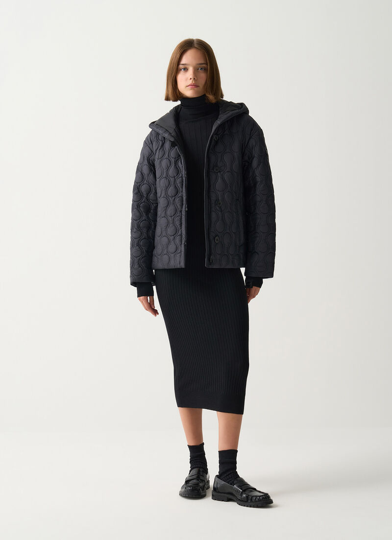 Light teardrop-quilted jacket.