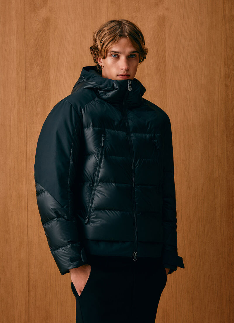 Down jacket with waxed sleeves