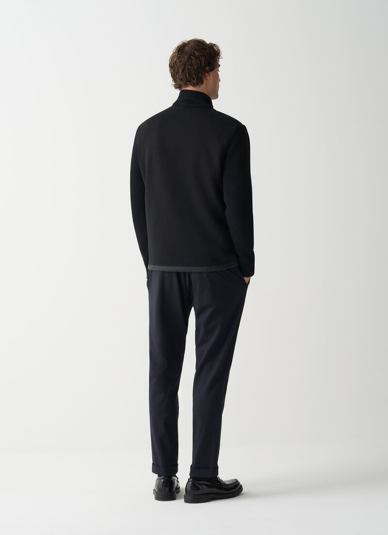 Jacket with knit sleeves