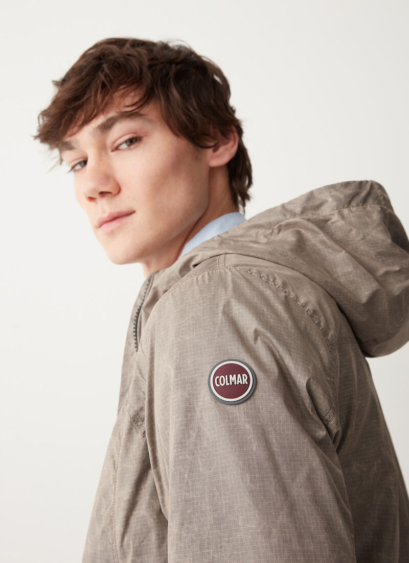 Hooded waxed fabric jacket