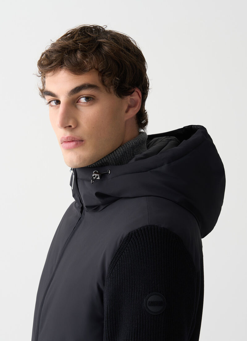 Padded jacket with knit sleeves