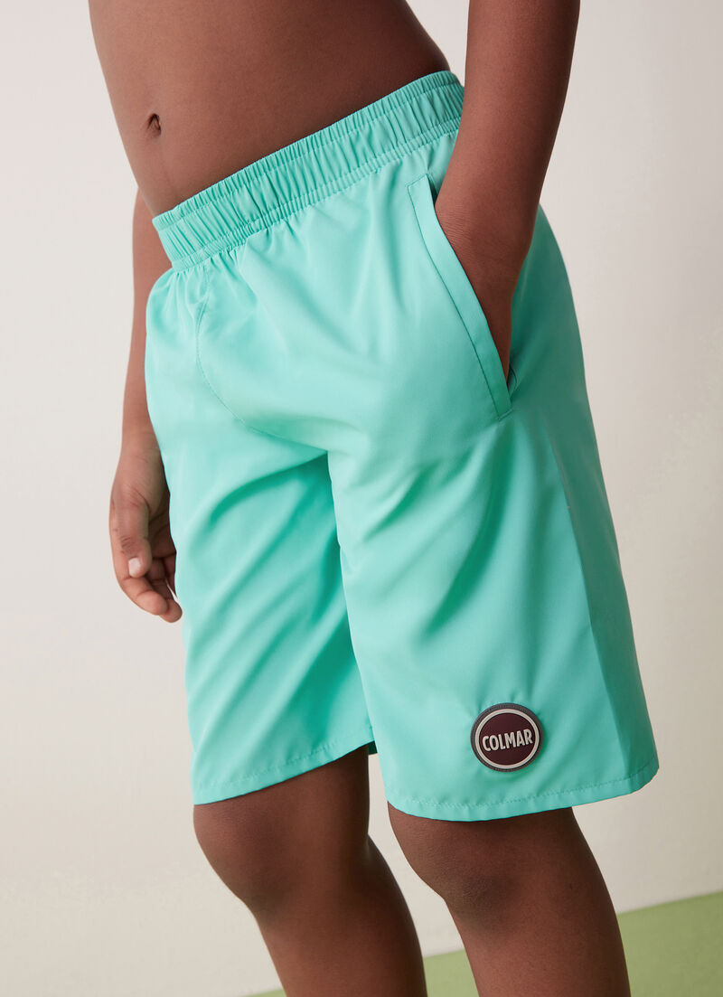 Solid colour swimsuit with elasticated waist