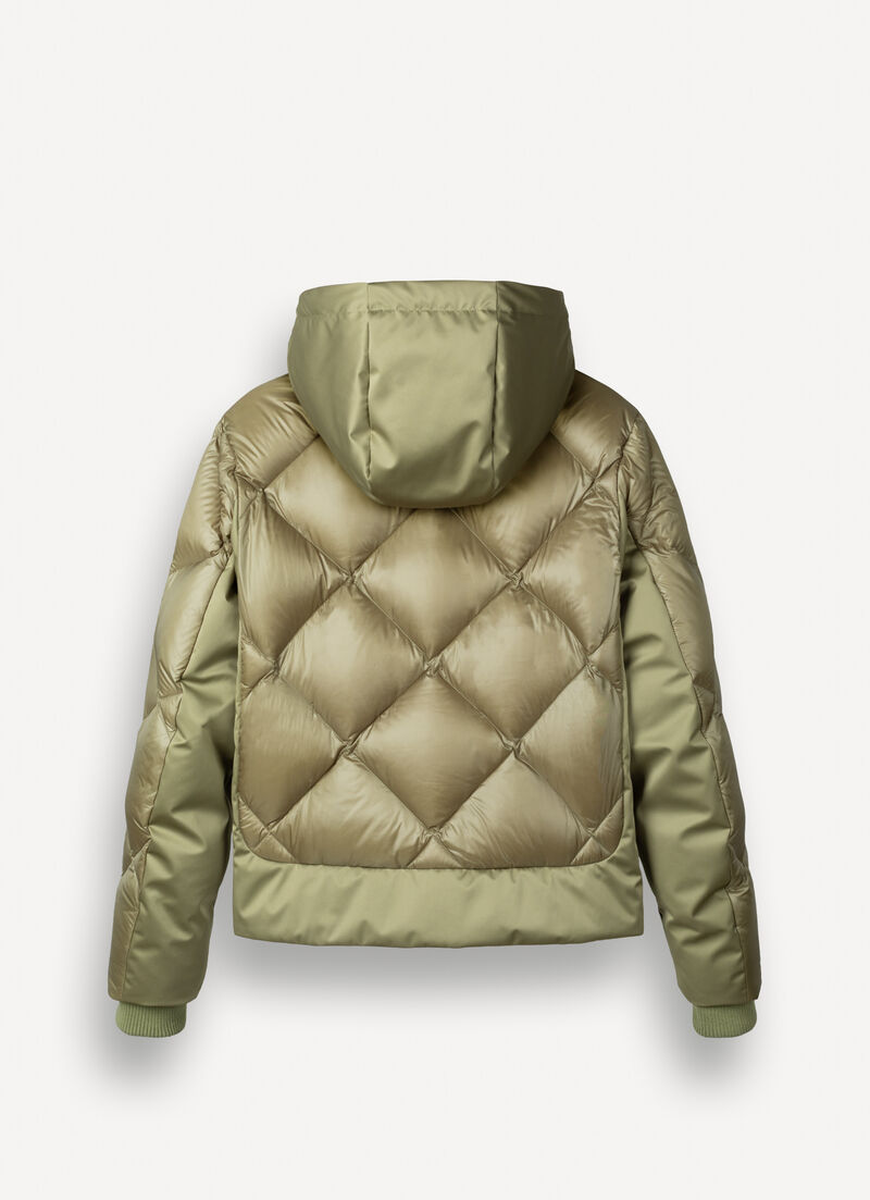 Down jacket with lateral side zip closure.