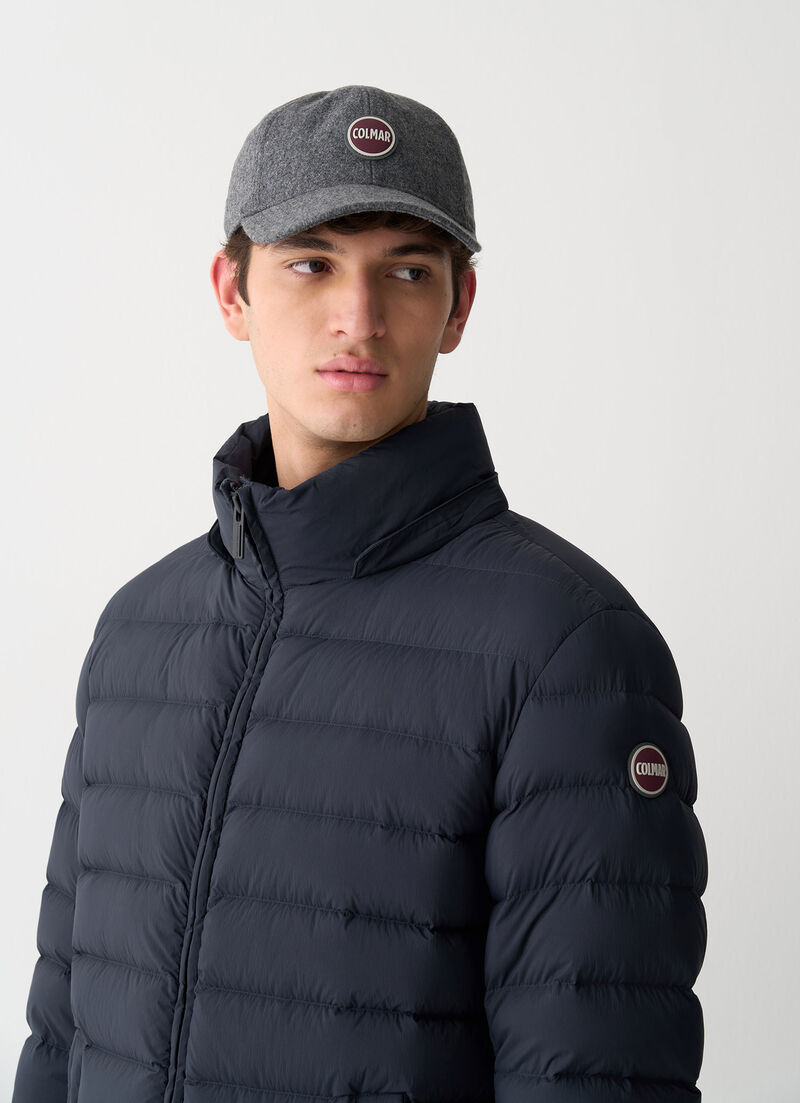 Quilted down jacket with side slits