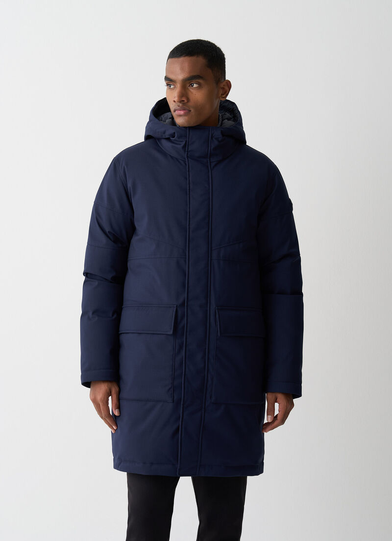 Long twill down jacket with patch pockets.