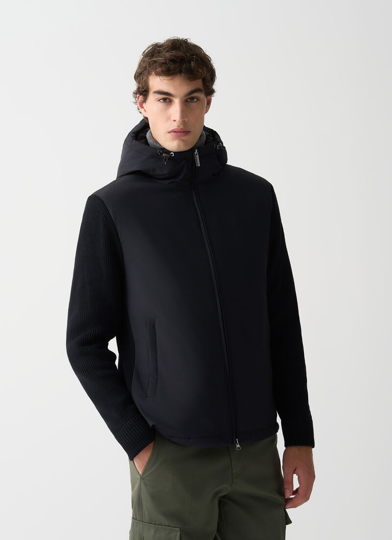 Padded jacket with knit sleeves