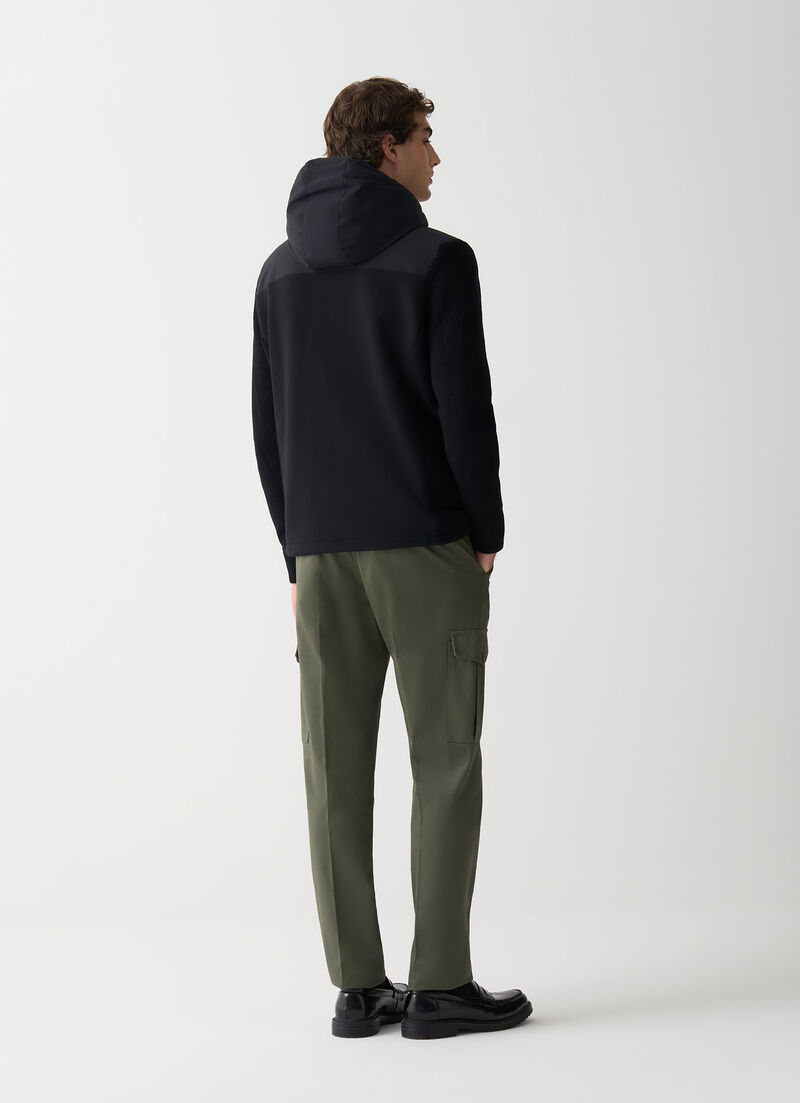 Padded jacket with knit sleeves