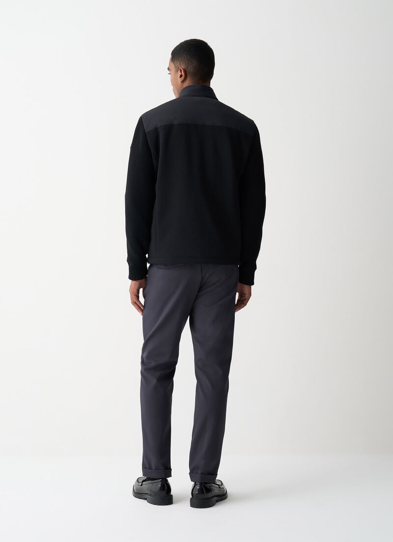 Biker jacket with knit sleeves