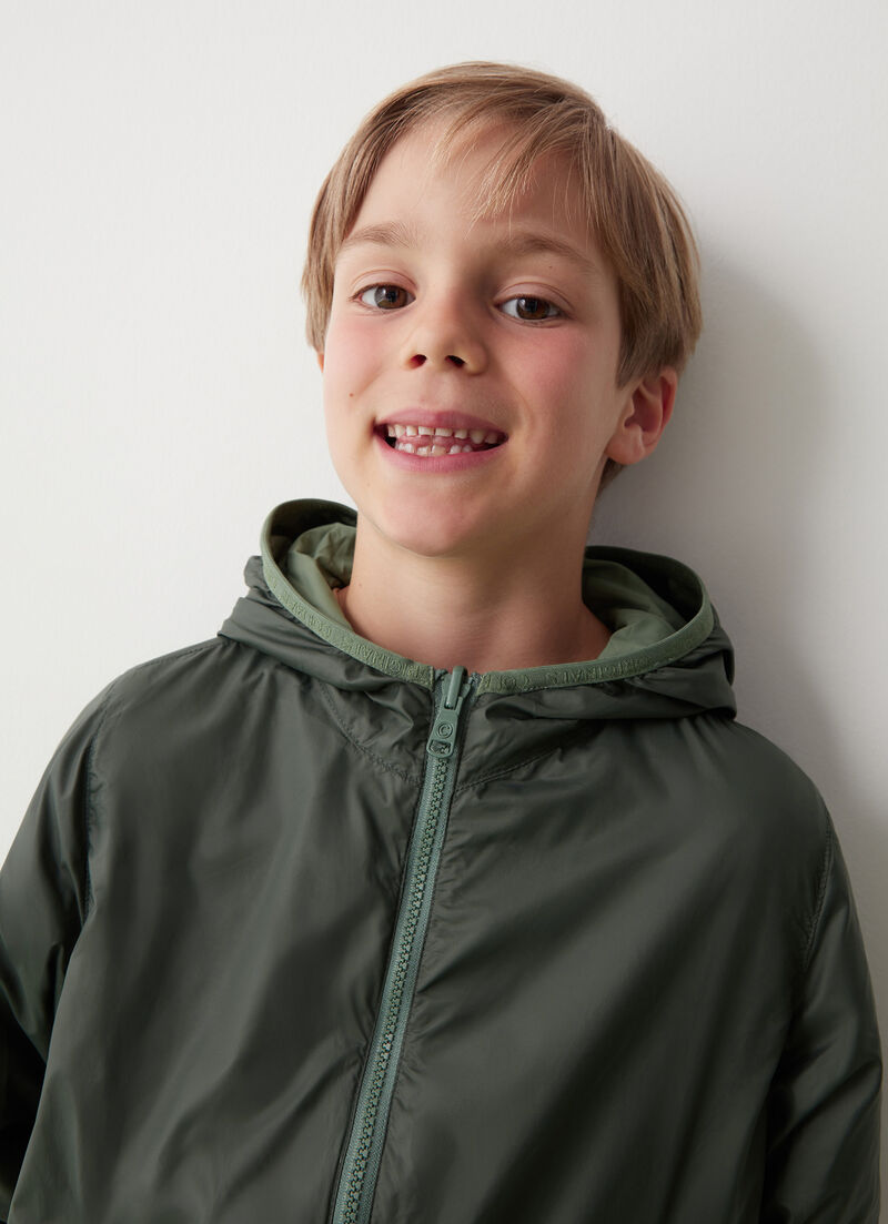 Reversible jacket with hood