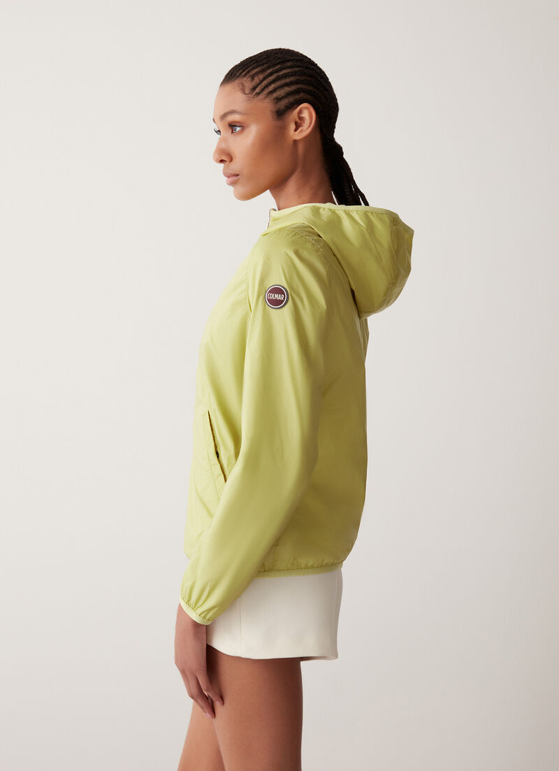 Reversible jacket with hood