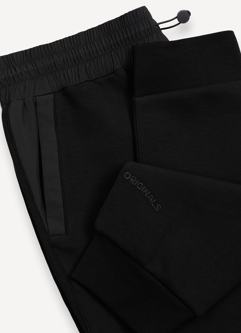 Tracksuit bottoms with nylon inserts