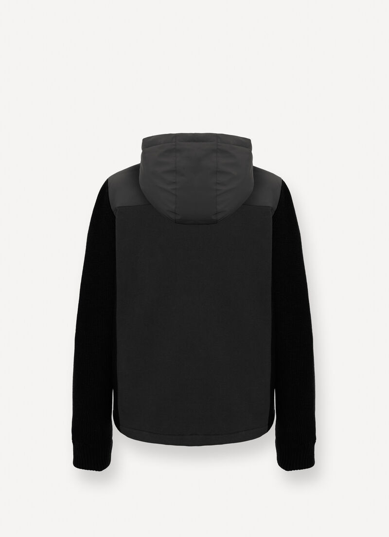 Padded jacket with knit sleeves