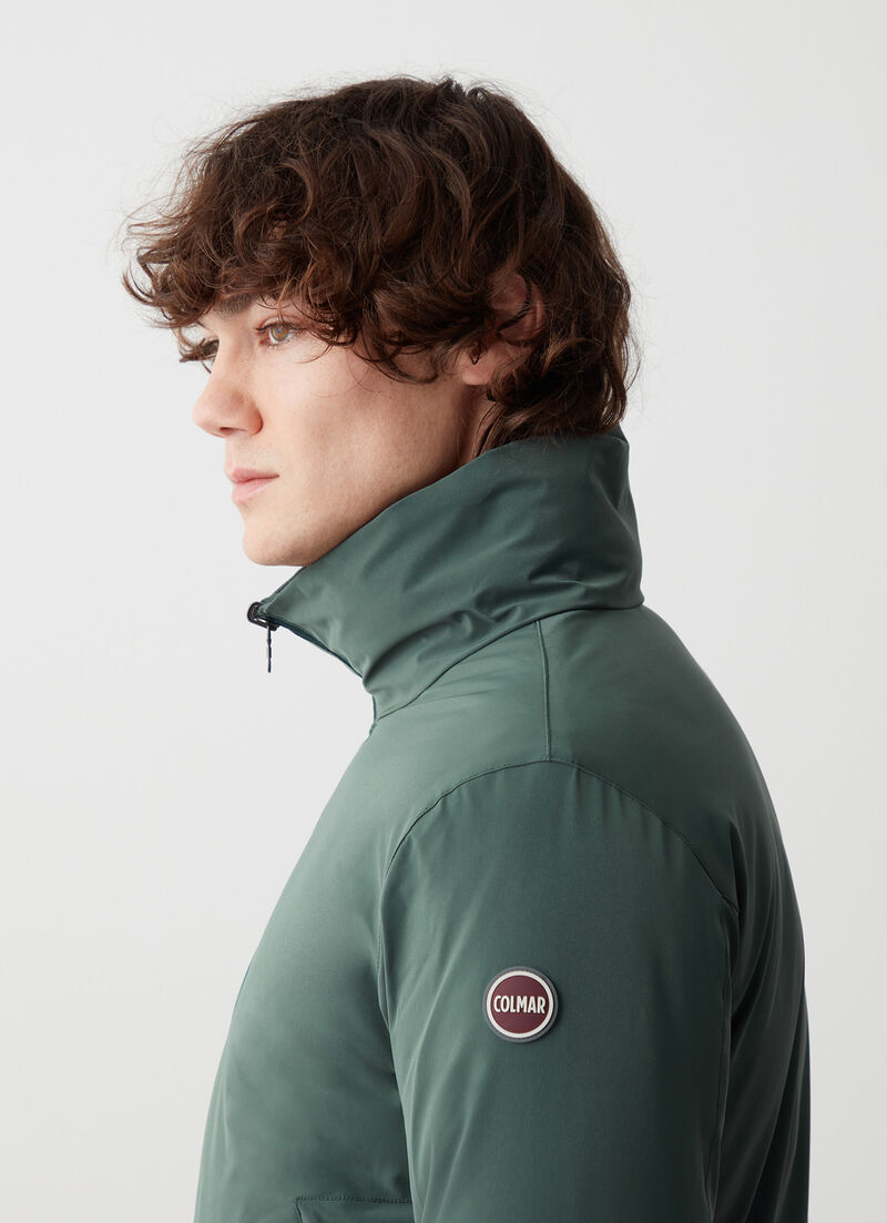 Reversible down jacket with seamless interior