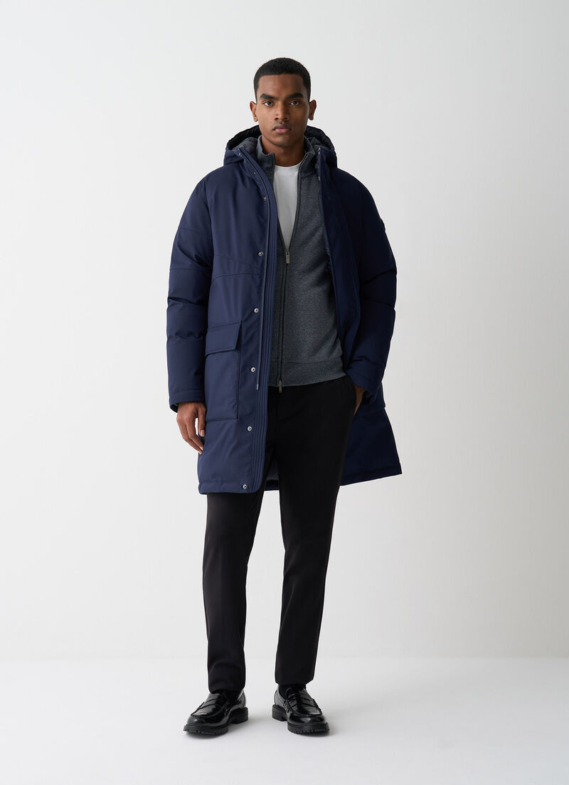 Long twill down jacket with patch pockets.